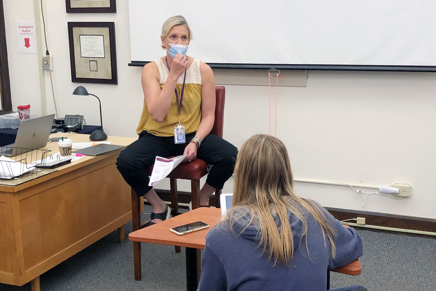 Counselor Mrs. Beth Brandes participated in a presser with the newspaper staff during E period on May 4. 