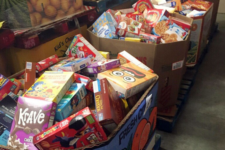 Boxes of cereal await delivery to local agencies. 