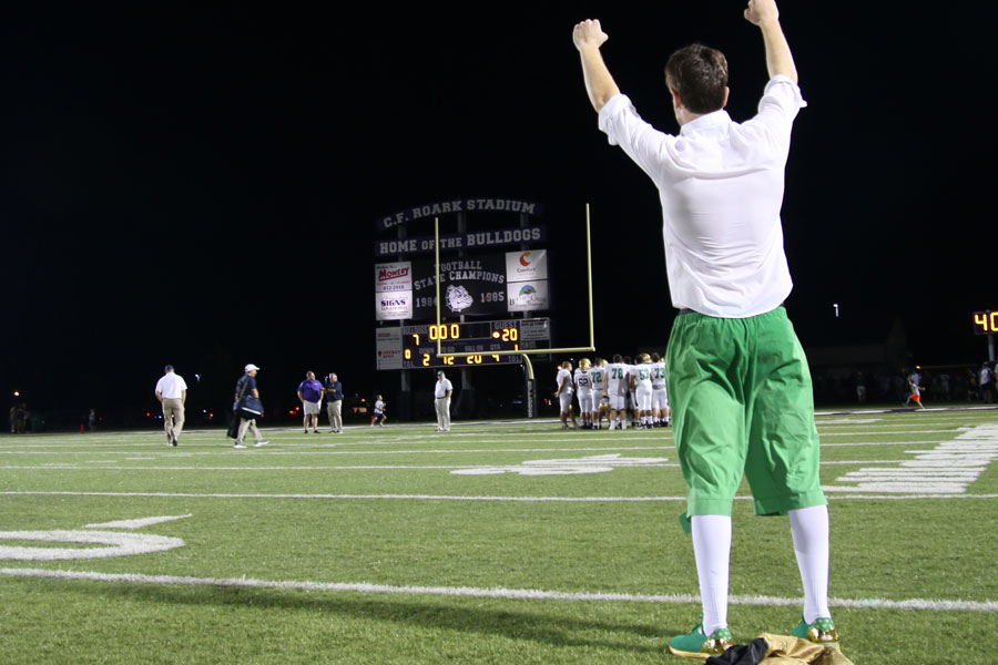 Leprechaun Will Mayer celebrates the 20-7 victory over the Brownsburg Bulldogs on Aug. 27. 