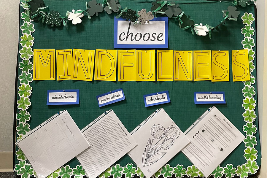 A sign out the office of Mrs. Aly Weaver ‘12 provides students with mindfulness strategies.