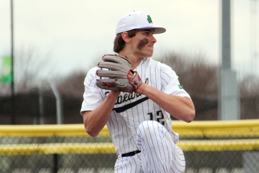 Senior Nick Bassi is a key member of the pitching rotation for the Irish. He throws heat during a game earlier this season played at Grand Park in Westfield.