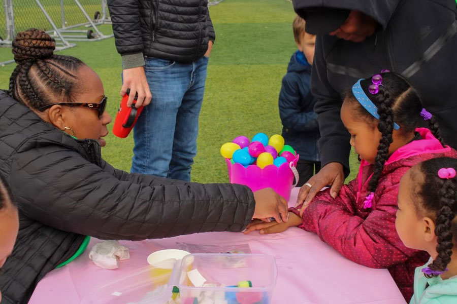 Easter-themed stickers and temporary tattoos were among the options for children who attend the school's annual Easter egg hunt.