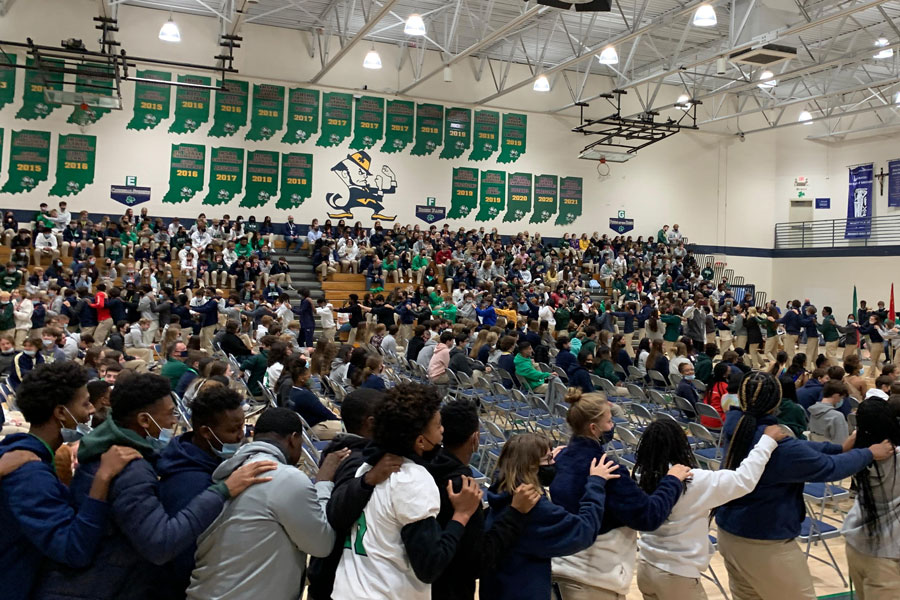 Students participate in the multicultural assembly in the Welch Activity Center. 