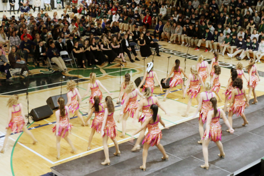 During an assembly in the Welch Activity Center, the award-winning show choir performs. 