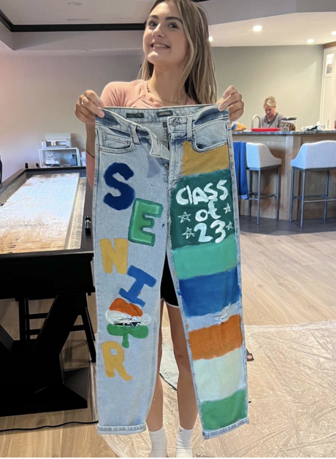 Senior Karsyn Kramer ’23 displaying her custom jeans for Homecoming.