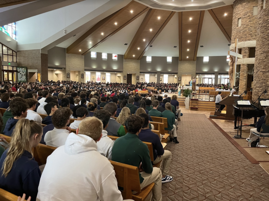 Cathedral seniors observe Mass with Archbishop Charles C. Thompson and the other Catholic schools.