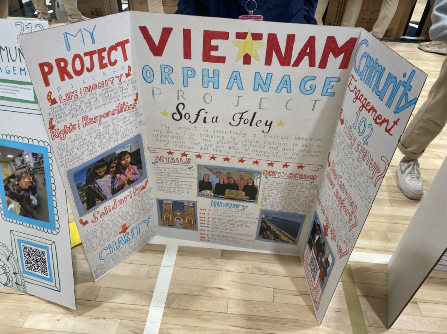 Junior Sofia Foley displays her St. Andre service project: an immersion trip to an orphanage in Vietnam.