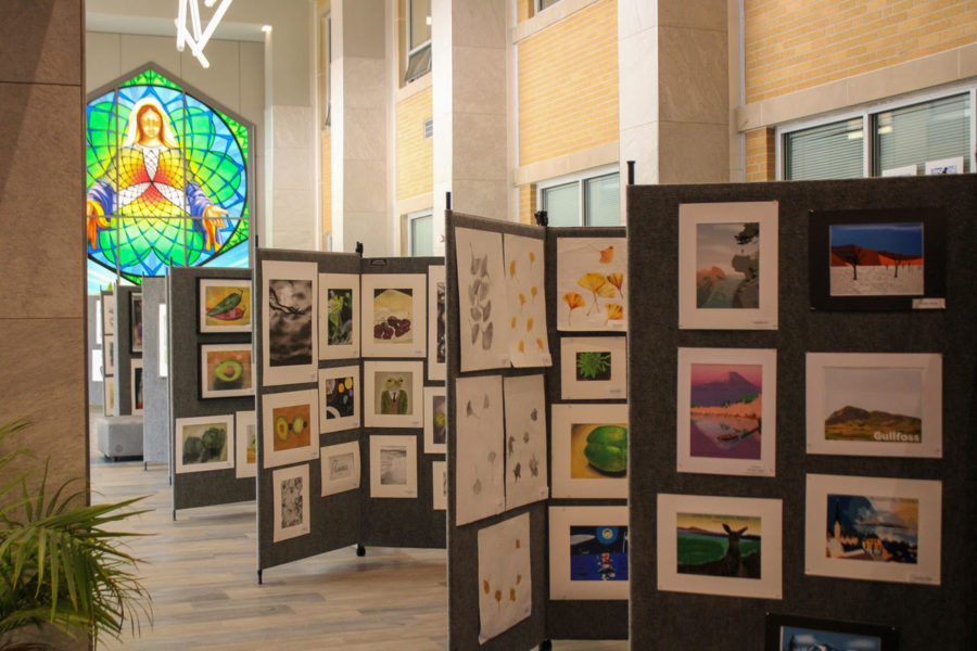 Cathedral fine arts students show off their talents during the Spring Art Show. Everything created from cameras to canvas are being proudly being presented on behalf of the fine arts department. Mrs. Joellen Desautels, a graphic arts and photography teacher, says, “It brings the artwork to the forefront and makes the student’s own perspective come through.”