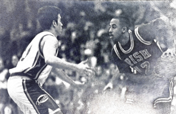 From the 1995 Cathedran, Senior guard Micah Shrewsberry overlooks his weaker competition en route to another assist. He was one of the areas leaders in this category.