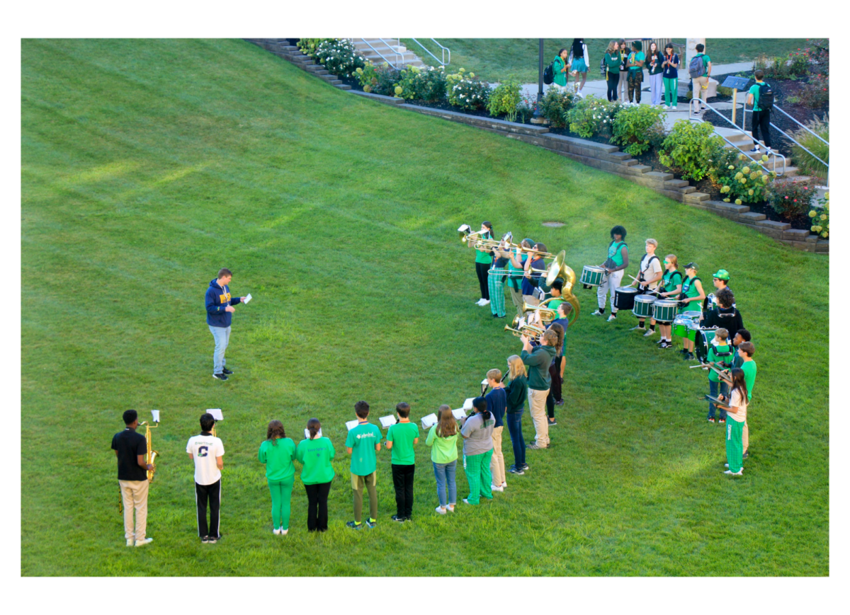 Cathedral’s band, Pride of the Irish,  outside creating a memorable morning to start off Homecoming week and All Out Irish. Cathedrals band has had some more involvement these past few days with opening up the Student Assembly last Friday and also having a new band director, Ian Callen. Lorrea Correra, a drummer for Band says, I love the environment and support the band creates and it is just a nice school activity to be a part of.”