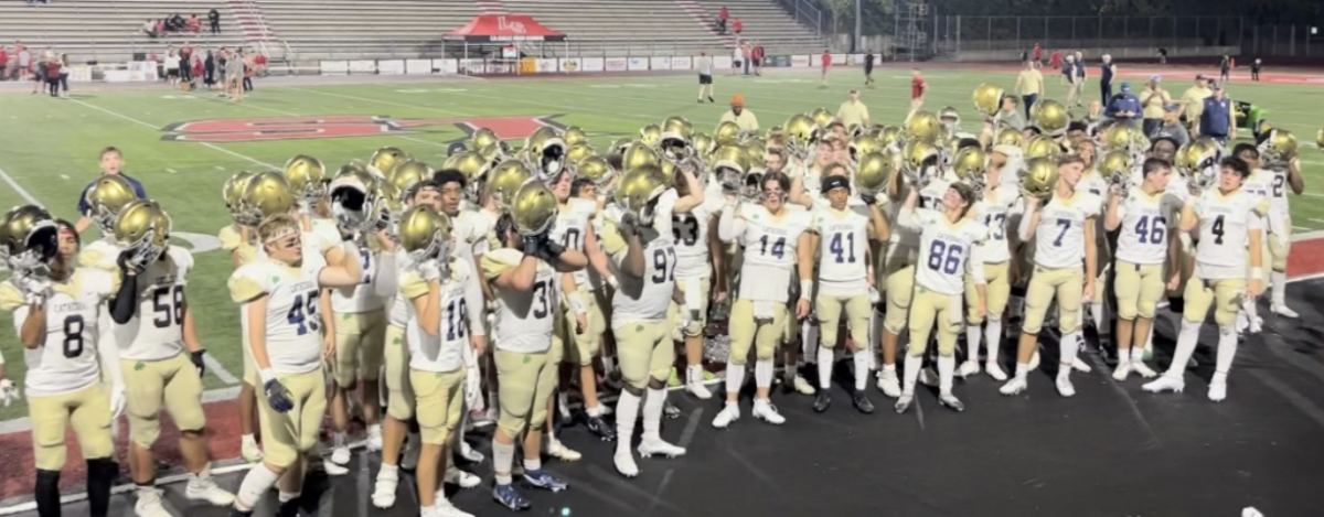 Cathedral Irish football team singing the school fight song in front of their classmates and fans.
This is one of the many traditions that make the Fighting Irish so special.
