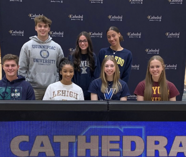 On Nov. 15, these seven seniors celebrated the signings of the NLIs to play Division 1 collegiate sports. 
The seniors are listed as follows (L-R): Back row: Joe Konesco, Lucy Marquart, Amya Usher Front row: J.T. Stiner, Kamryn Utley, Taylor Lewis, Catherine Cline
