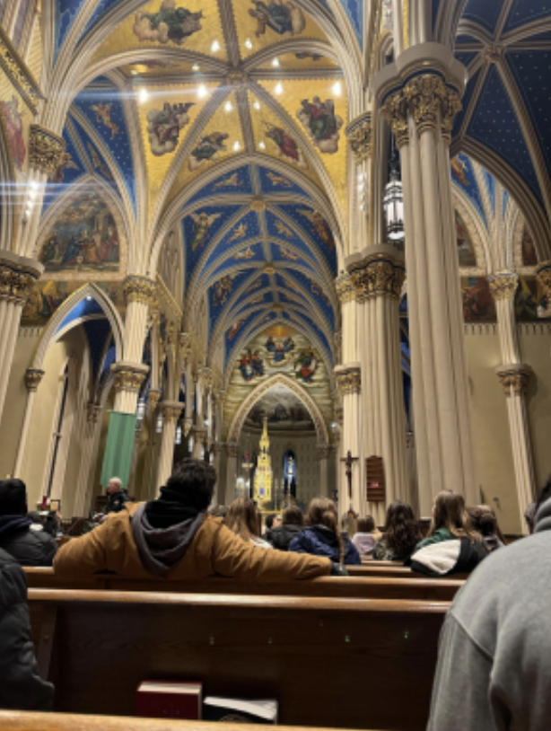 The retreat group enjoys silence and reflection in the Basilica on the University of Notre Dame’s campus