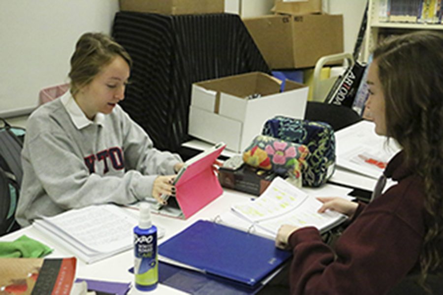 Seniors Maria Carlson and Sarah Collins study during flex on Nov. 28. School counselor Mrs. Gretchen Watko ’01 said, “Finals can be a great way to boost your grade. It could make it or break it for the semester grade.”
