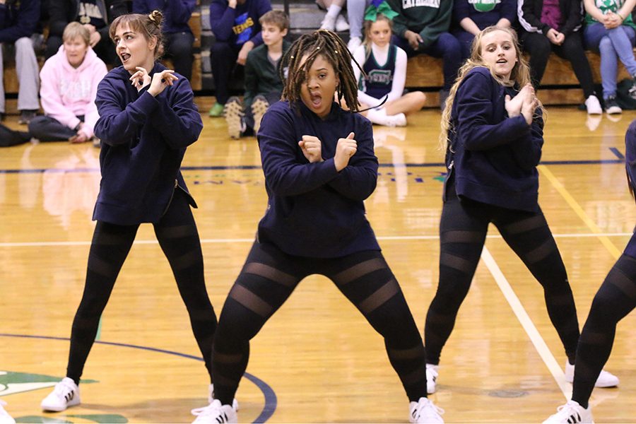 Seniors Elise Cassidy and Sydney Giles and junior Sarah Schildmeyer perform at Winterfest on Feb. 10. 