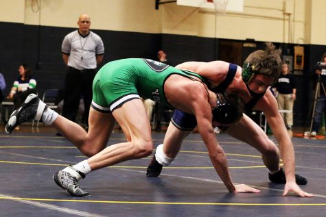 During the regular season match against Yorktown junior Christian Hunt, senior Breyden Bailey competes at 132 pounds.