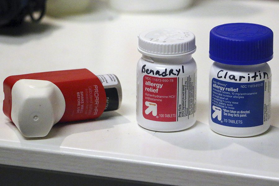 Students will often take medications like those pictured here or use an inhaler to help cope with their allergies.