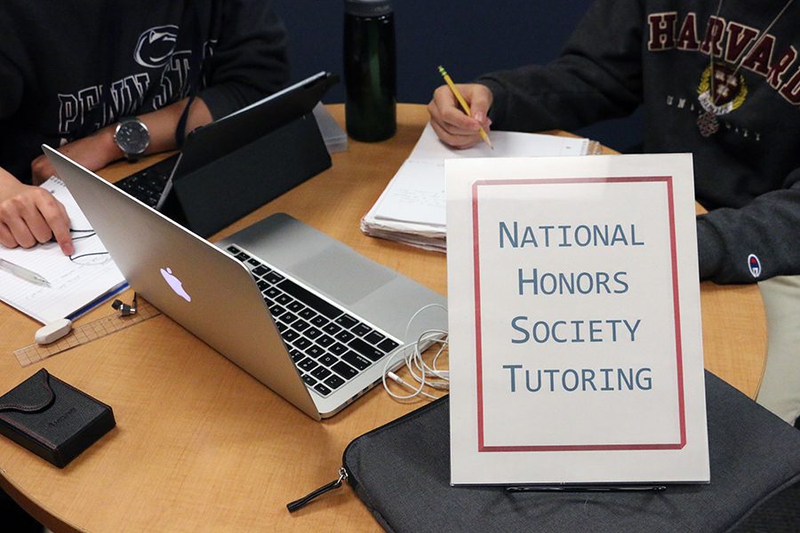 The new members of the National Honor Society, who will be inducted March 26, will provide tutoring in the library as part of their community service activities. 