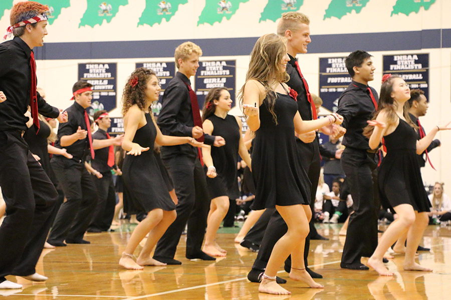 Members of last year's Latin Dance team perform during last year's Homecoming assembly.