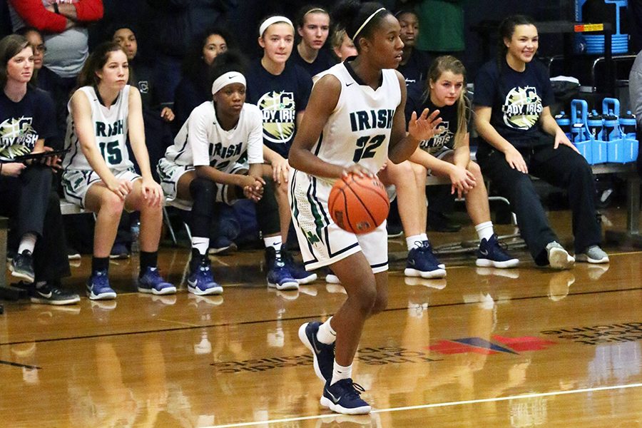 Sophomore Justis Gordon brings the ball up the court during the Roncalli game. Gordon and her teammates will host Plainfield on Nov. 29 and travel to Brownsburg on Dec. 1.