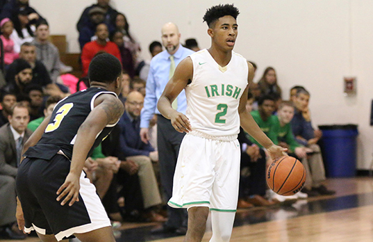 Junior Armaan Franklin brings the ball up the court during a recent varsity game.