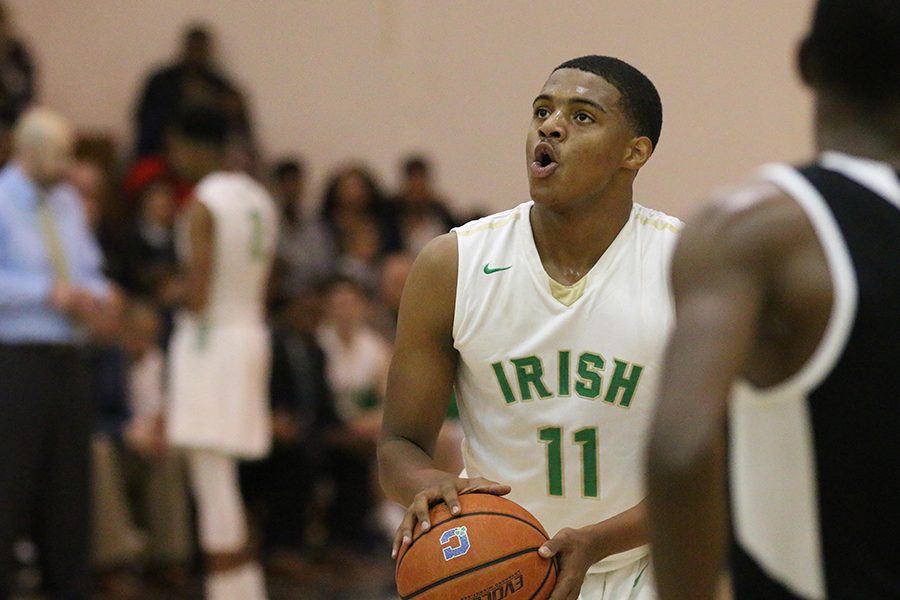 Senior Jarron Coleman and the men's varsity basketball team will travel to South Bend to take on second-ranked Riley on Feb. 10. 