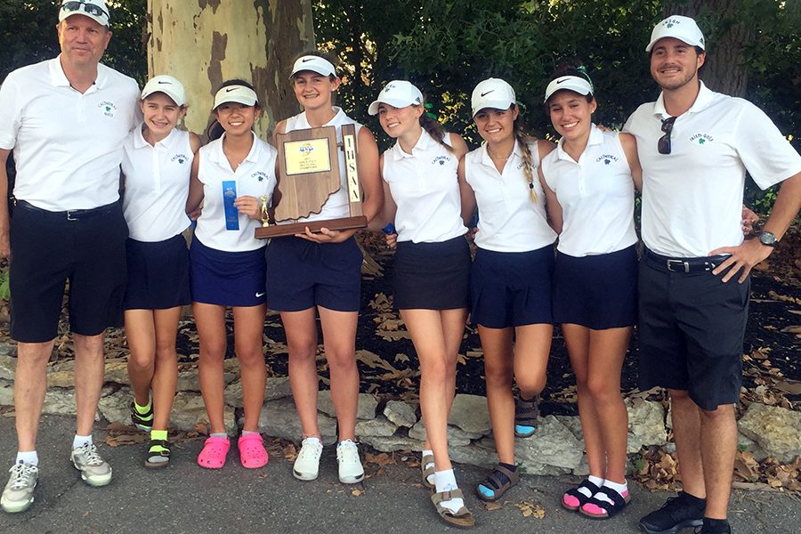 Mr. Mike Miller, far left, has announced his retirement as head coach of the women's golf team. 