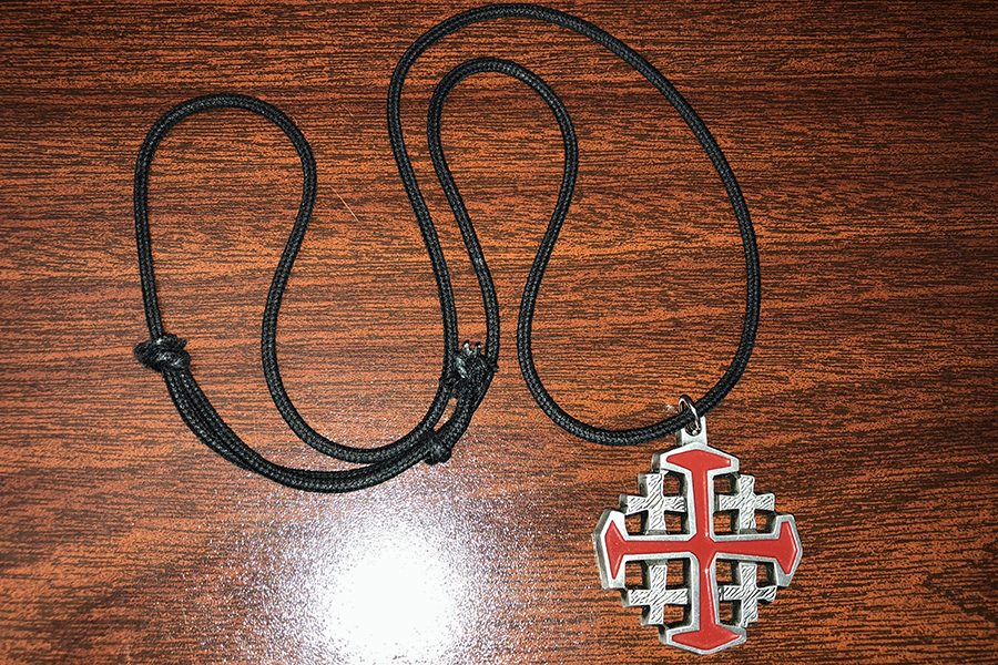 Seniors who attend retreat receive a cross to wear to remind them of their retreat experience. 