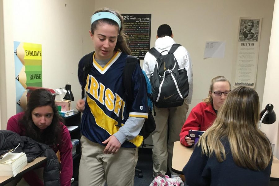 Seniors Sofia Alatorre, Molly Beatty, Caroline Mages and Lauren Smith volunteer in the writing center.