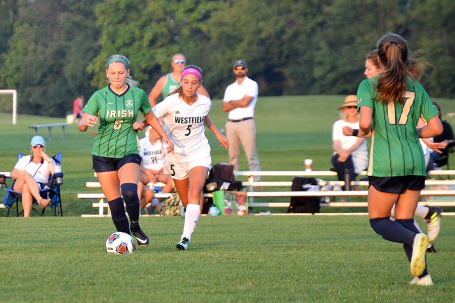 The women's soccer team takes on Westfield during a match earlier this season.