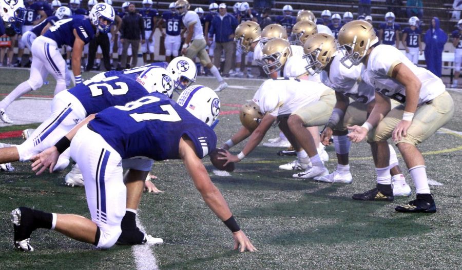 The varsity football team, shown in action earlier in the season against Bishop Chatard, travels to Jeffersonville on Sept. 21 for a 7 p.m. kickoff. 