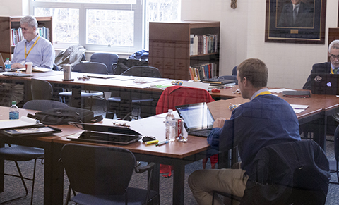 Members of the ISACS visitation team work in the Baker board room during G period on Nov. 12.