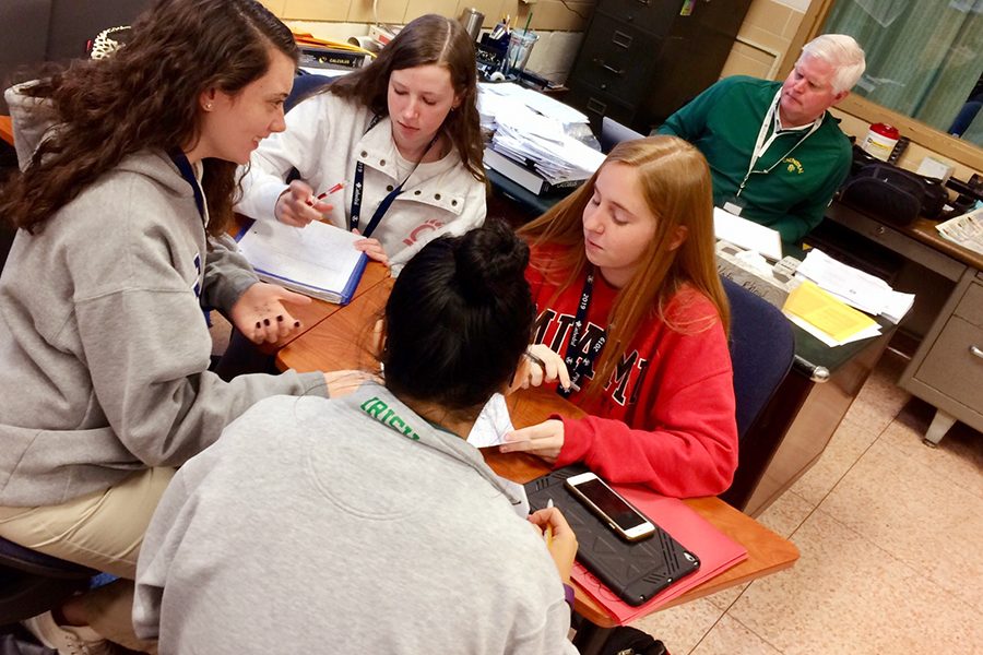 During Mr. Rick Shadiow's math classroom in Kelly Hall, seniors Katie Kelly, Cami Cerefin, Sarah Hoffman and Kate Albean study for their next test. 