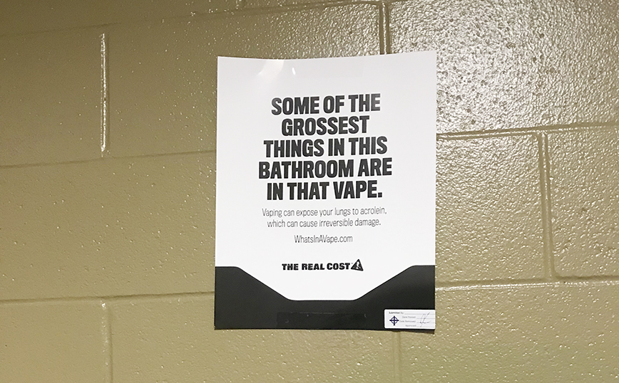 To deter use of the Juul, the school has put up posters by multiple bathrooms to inform students of risks associated with vaping.