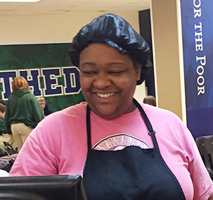 Miss Felicia Jackson is happy to assist students during third lunch on Feb. 6.