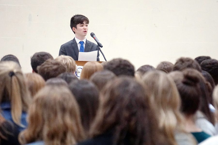 Senior Brendan Hurley speaks during the National Honor Society induction ceremony on April 28. 