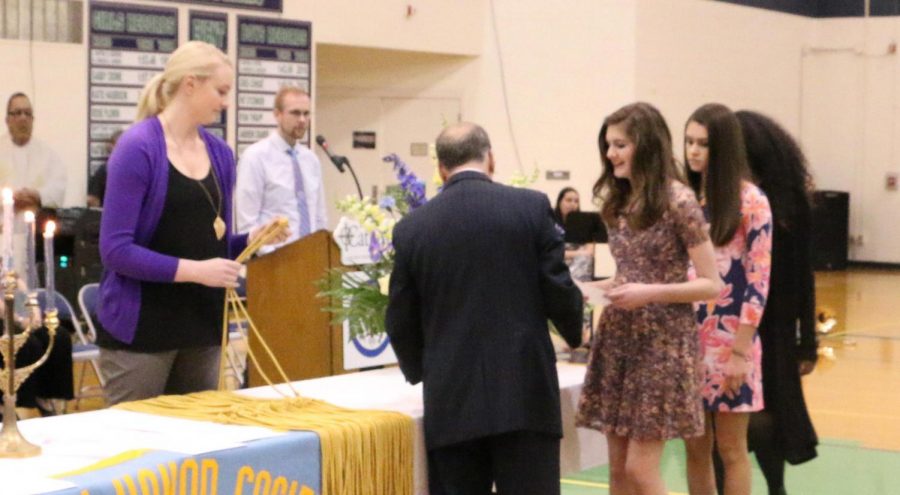 Students from the Class of 2017 receive their chords at the National Honors Society ceremony. This year's event will take place April 28 in the Welch Activity Center. 