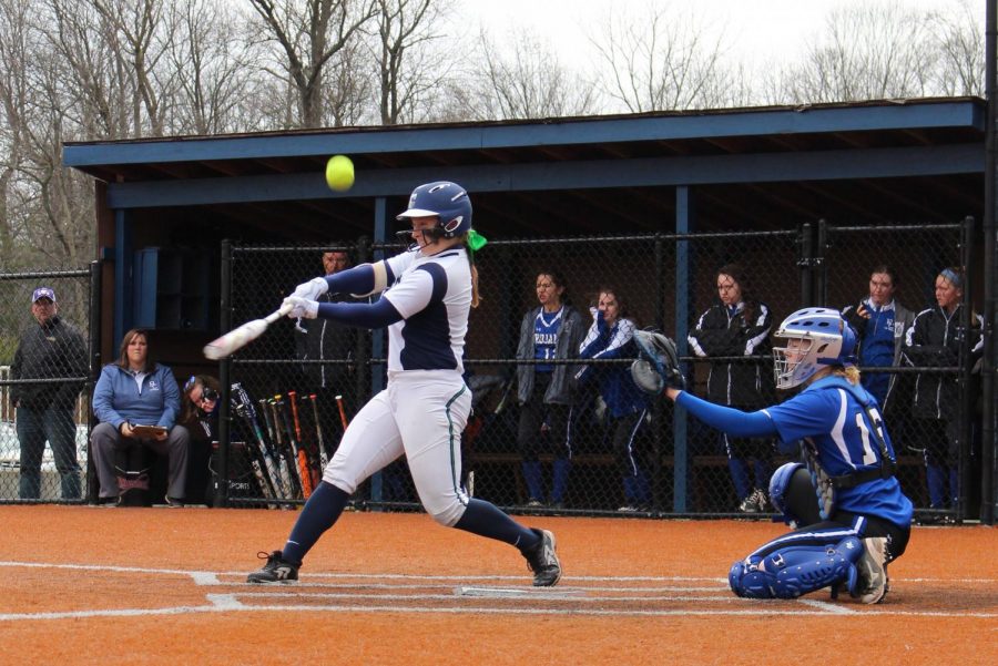 The varsity softball team, shown in action last year, plays several games during the week of April 8. 