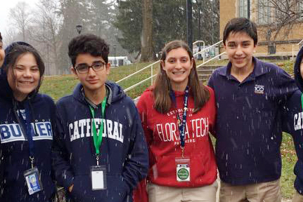 Earlier this school year, senior Gia Peduto, wearing a red sweatshirt, stood with visiting students from Guatemala. On May 7, she cast her vote in the primary election. 