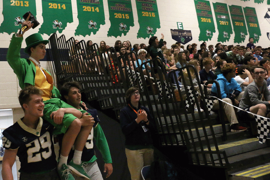 Junior Max Beatty is carried into the Welch Activity Center on May 17 during the Irish 500, resplendent in his leprechaun gear. 