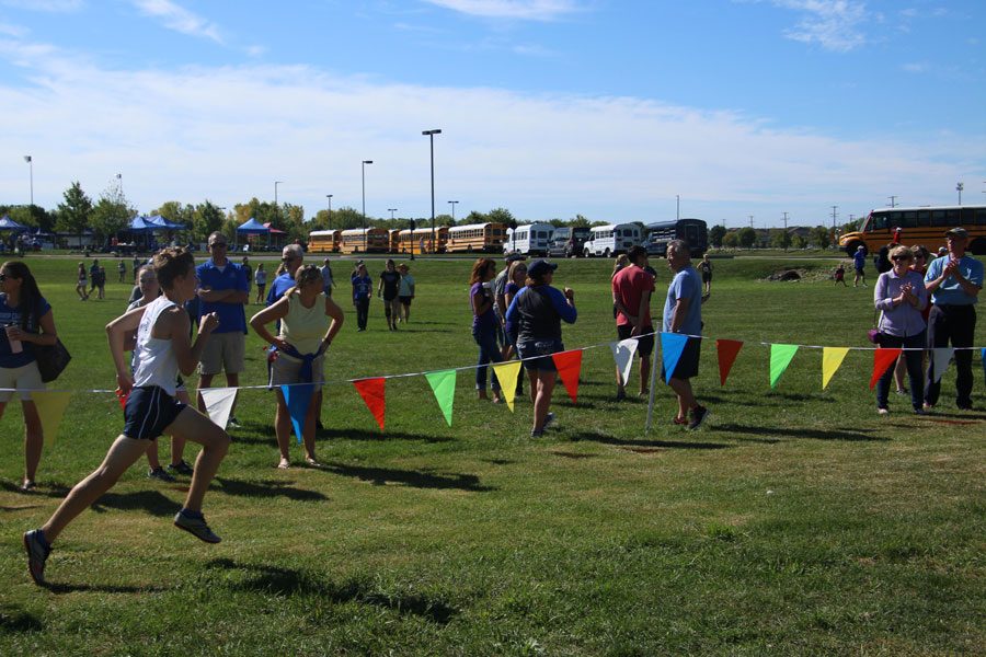 Junior Toby Bradshaw approaches the finish line at a recent men's cross-country meet. 