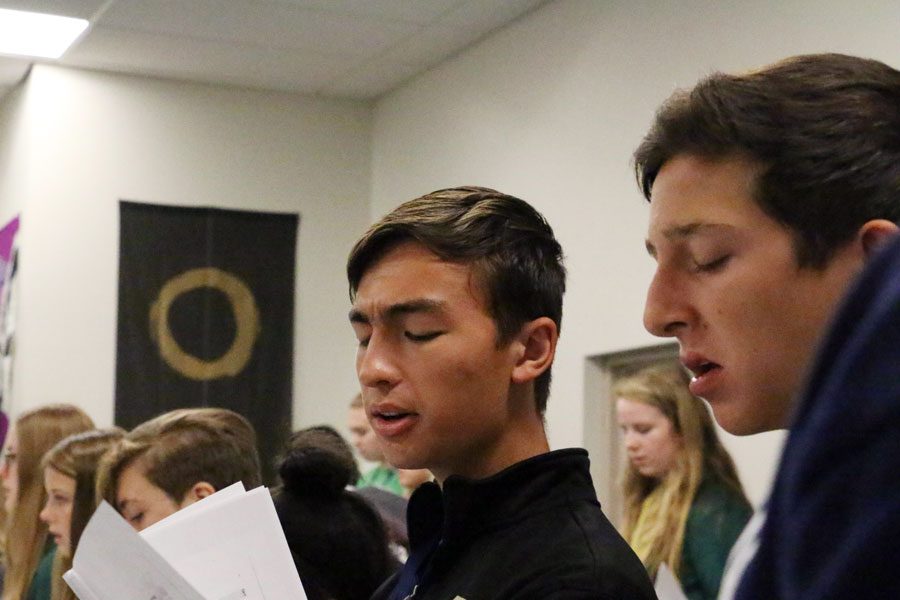 Senior Nick Grill, at left  in choir class last year, earned a perfect score on the ACT. 