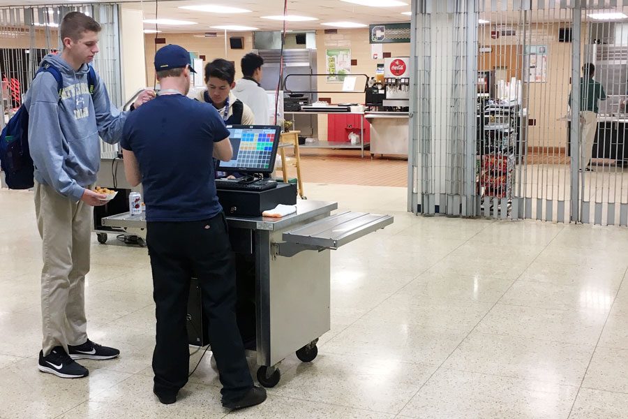 Students buy food in the cafeteria during flex on Oct. 25. Starting Oct. 28, they also will be able to make purchases after school. 