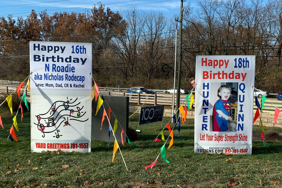 Birthday signs displayed at the entrance are a school tradition.