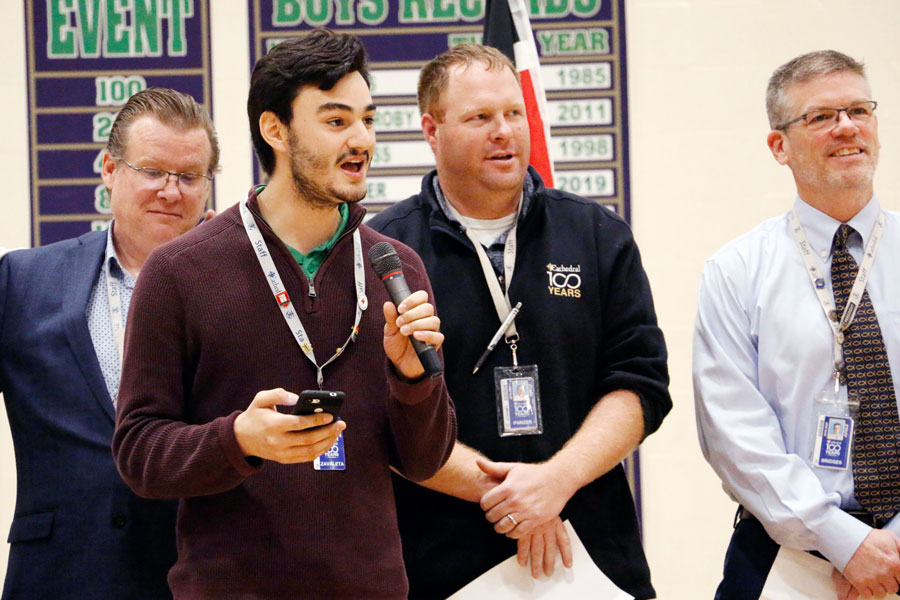 With microphone in hand, Mr. Tristan Zavaleta led the singing at the multicultural assembly earlier this school year. 