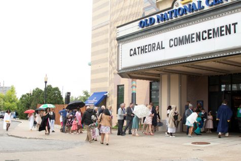 Friends and family members arrive at the Old National Centre for last year's graduation ceremonies. 