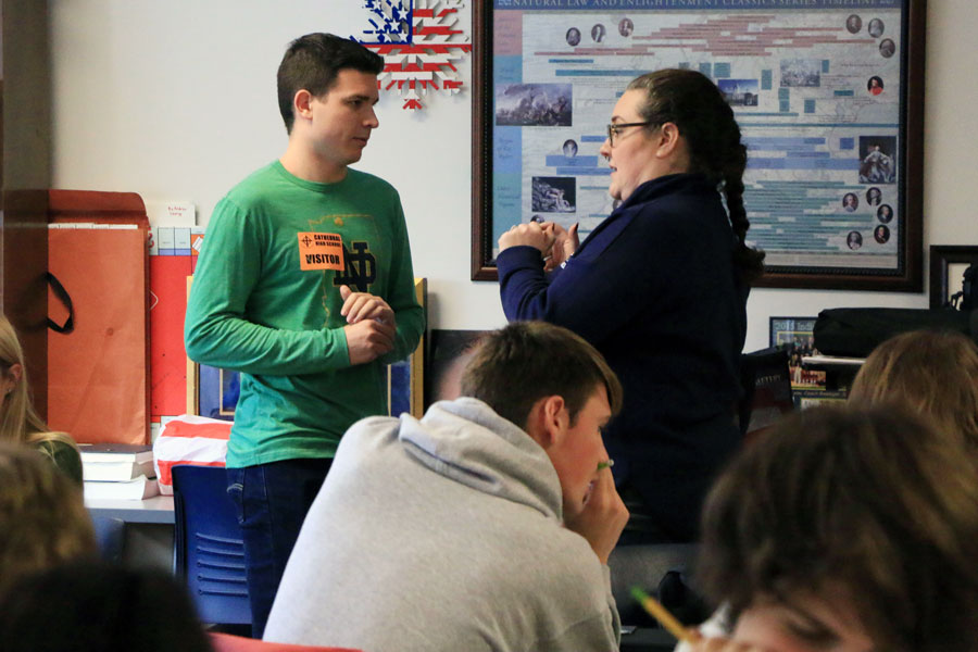 In her classroom on the second floor of Kelly Hall, social studies teacher Mrs. Jill Twilleager visits with former student Stephen Vukovits '17. 