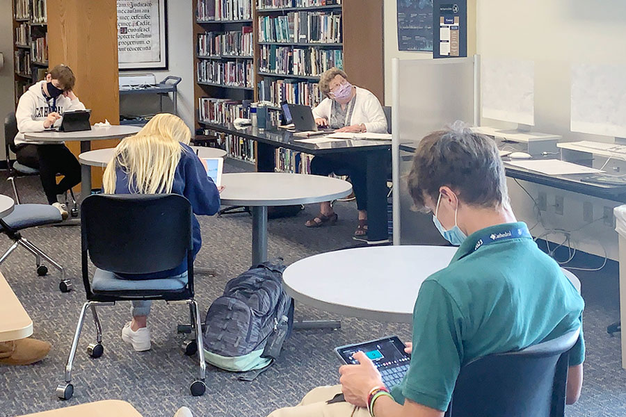 During G period on Sept. 22, social studies teacher Sr. Mary Ann Stewart checks out the video monitor. Sr. Stewart is instructing all of her classes in the library this year. 