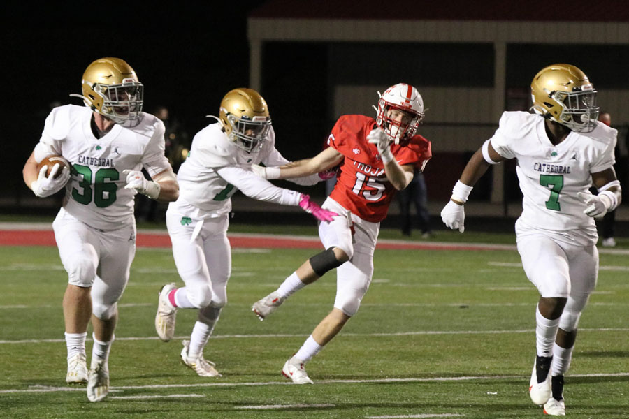 With blocking in place, senior John Koscielski advances the ball up the field at Center Grove. 