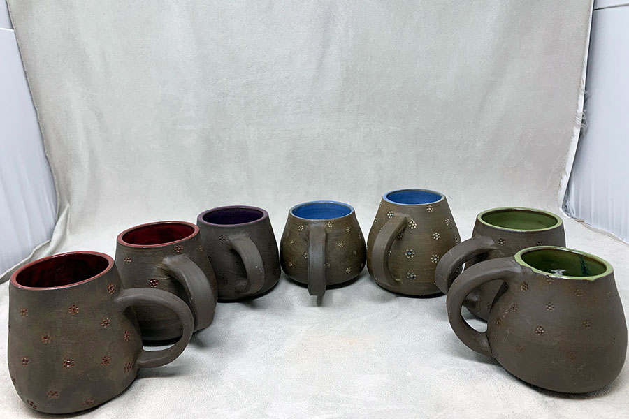 Projects such as these finished by students enrolled in Mrs. Sara Greene’s ceramics classes now will become work done by engineering students as part of a collaborative effort.